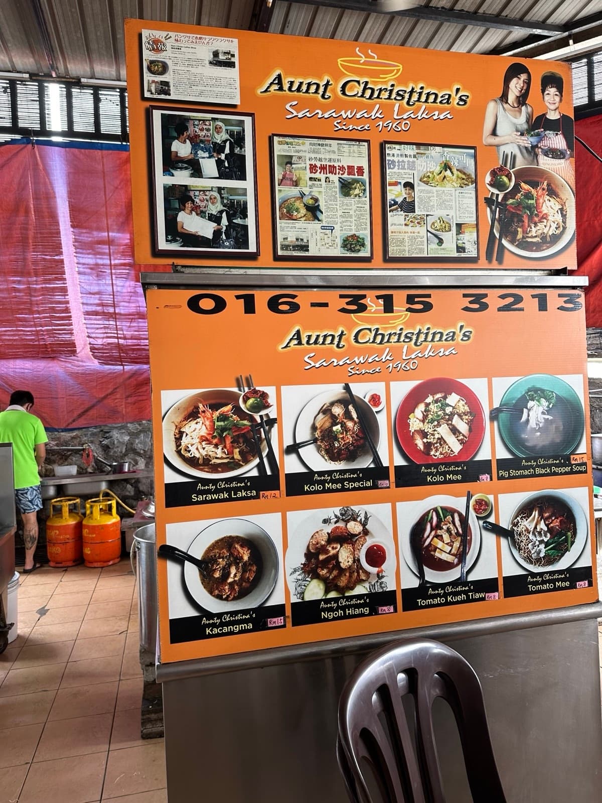 Aunty Christina's Sarawak Laksa stall and menu board in Sea Park, Petaling Jaya
